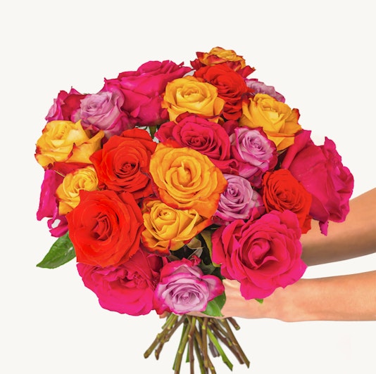 Vibrant bouquet of assorted roses in shades of pink, yellow, and orange, ideal for celebrations.